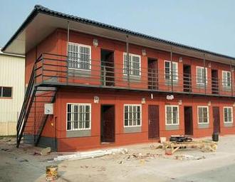 What model does flat-pack containers house adopt?