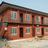 What model does flat-pack containers house adopt?
