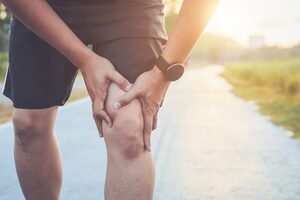 When is knee replacement surgery recommended?