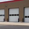 Elevate Your Home&#039;s Curb Appeal with Glass and Black Garage Doors