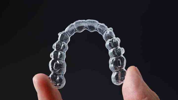 What Does an Invisalign Dentist Dubai Do?