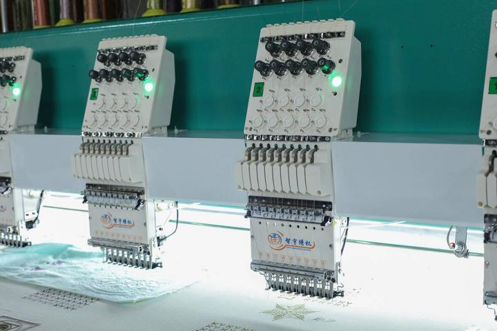 Dividing embroidery machines by embroidery function